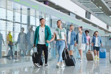 Passengers walking at the airport.jpeg