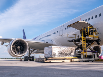 web_air-cargo-logistic-containers-loading-airplane_Credit_supakitswn_shutterstock_2377477671_2000x1500.png